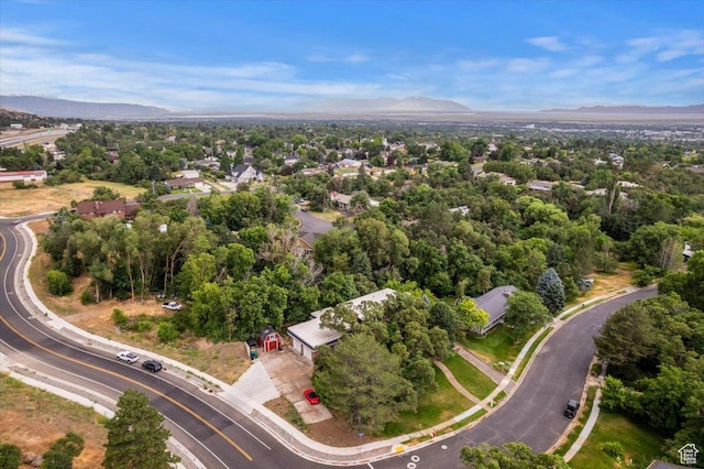 birds eye view of property with a mountain view