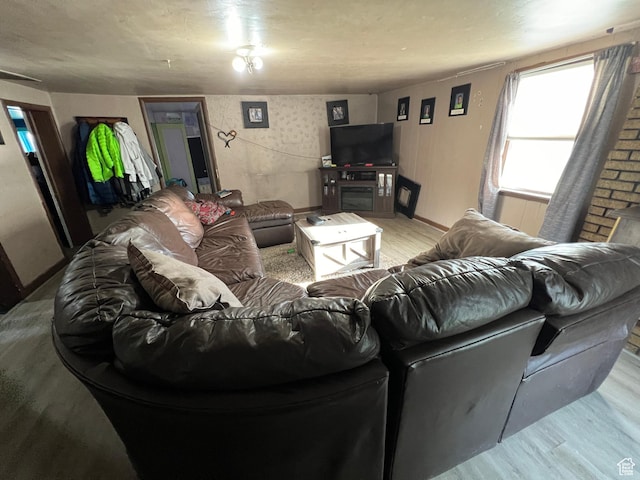 736 E Hatchery Rd, Bicknell, UT 84715 - living room with baseboards and light wood-style flooring