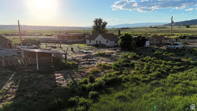 736 E Hatchery Rd, Bicknell, UT 84715 - view of yard featuring a mountain view, fence, and a rural view