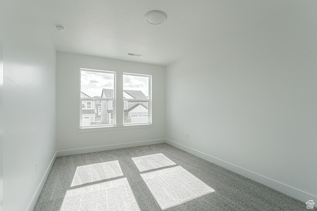 empty room with light carpet
