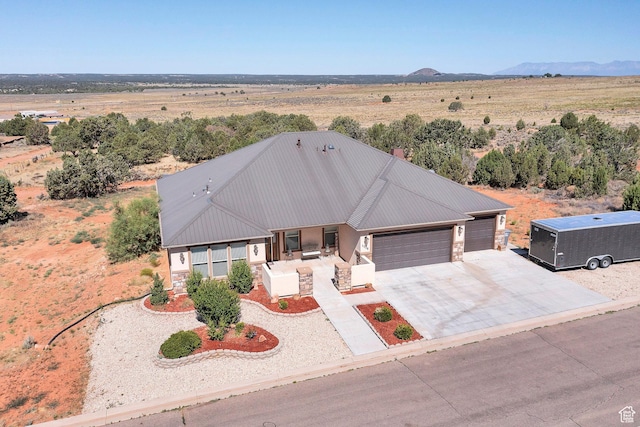 1536 S Cliff Dr, Apple Valley, UT 84737 - view of front of home featuring a garage and a mountain view