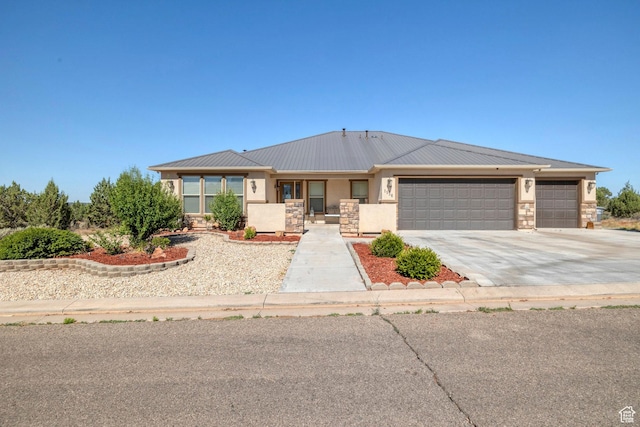 view of front of property with a garage