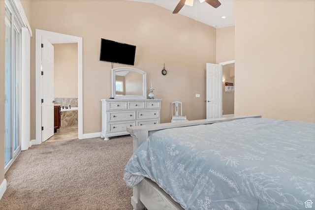 1536 S Cliff Dr, Apple Valley, UT 84737 - bedroom featuring light carpet, ceiling fan, ensuite bathroom, and vaulted ceiling
