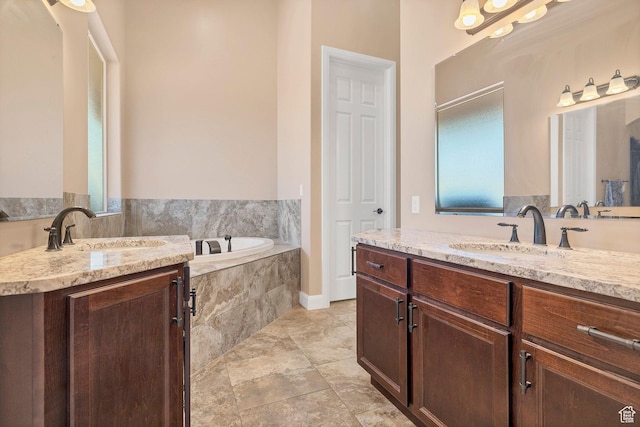 1536 S Cliff Dr, Apple Valley, UT 84737 - bathroom featuring a relaxing tiled tub and vanity