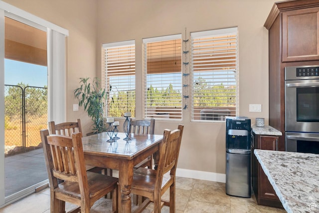 1536 S Cliff Dr, Apple Valley, UT 84737 - tiled dining room with a healthy amount of sunlight