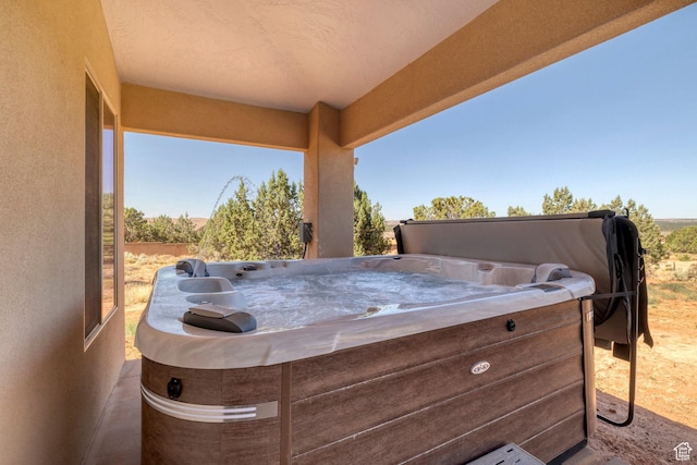 1536 S Cliff Dr, Apple Valley, UT 84737 - view of patio with a hot tub