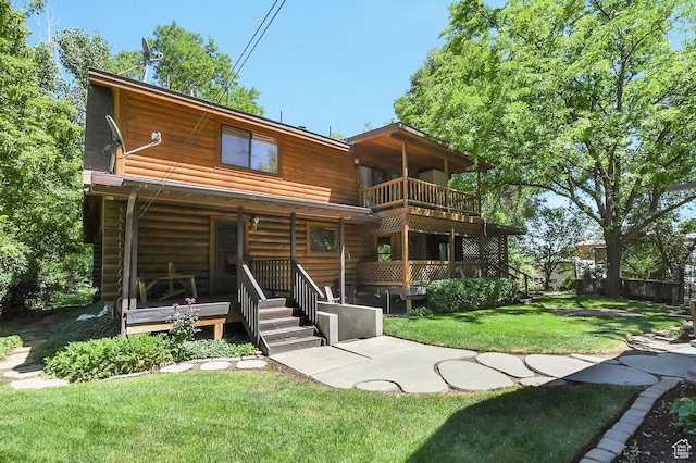 11996 S 3600 W, Riverton, UT 84065 - back of house with a porch and a lawn