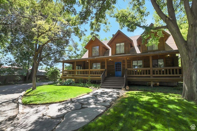 11996 S 3600 W, Riverton, UT 84065 - log cabin with covered porch and a front lawn