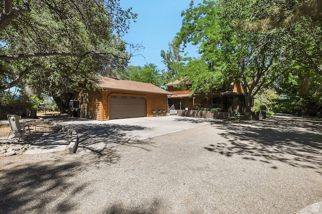 11996 S 3600 W, Riverton, UT 84065 - view of front facade featuring driveway and an attached garage