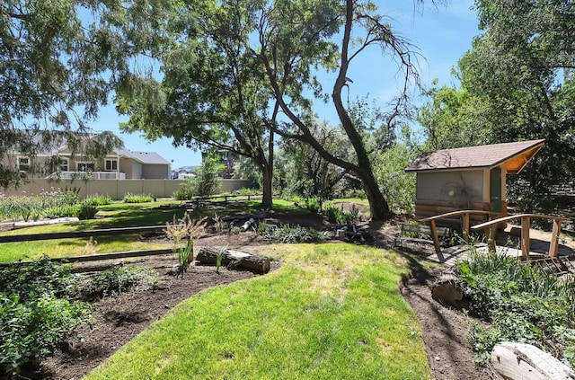 11996 S 3600 W, Riverton, UT 84065 - view of yard with a storage unit, fence, and an outdoor structure