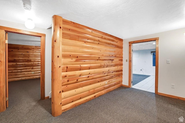 11996 S 3600 W, Riverton, UT 84065 - carpeted empty room featuring a textured ceiling, rustic walls, and baseboards
