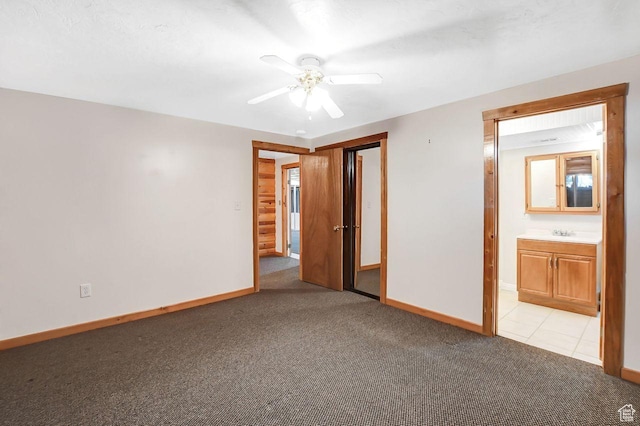 11996 S 3600 W, Riverton, UT 84065 - unfurnished bedroom with baseboards, a closet, a sink, and light colored carpet