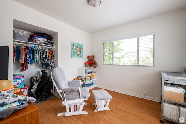 6 Park Ave, Tooele, UT 84074 - bedroom with wood finished floors, a closet, and baseboards
