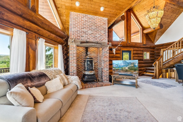 6690 N State Road 32, Peoa, UT 84061 - carpeted living area featuring wooden ceiling, high vaulted ceiling, a wood stove, and an inviting chandelier