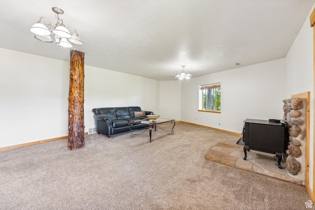 6690 N State Road 32, Peoa, UT 84061 - sitting room featuring baseboards, carpet, a chandelier, and a wood stove