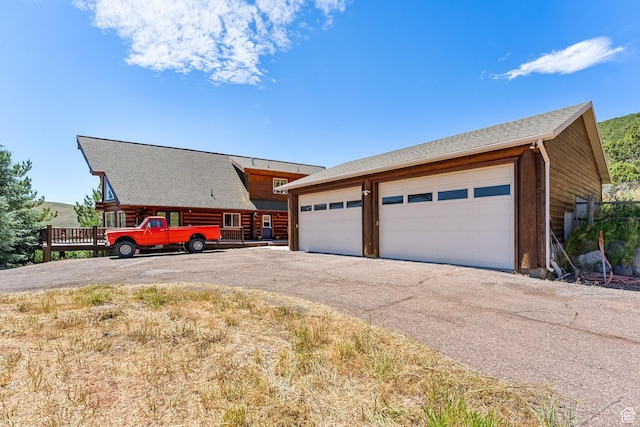 6690 N State Road 32, Peoa, UT 84061 - view of front facade featuring an outdoor structure and driveway