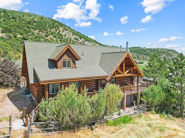 6690 N State Road 32, Peoa, UT 84061 - view of front of house featuring a mountain view and log exterior