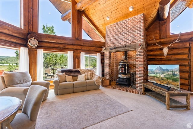 6690 N State Road 32, Peoa, UT 84061 - living room featuring beam ceiling, high vaulted ceiling, carpet floors, wooden ceiling, and a wood stove