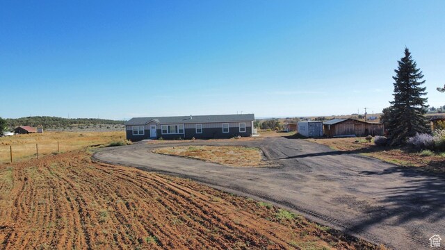 944 E Kiva Dr, Blanding, UT 84511 - ranch-style home with fence