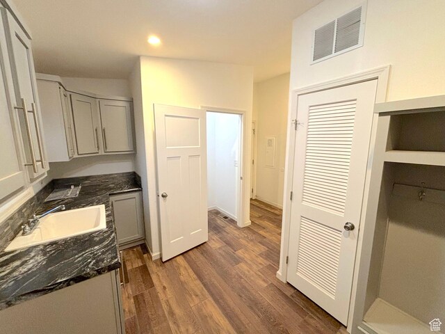 944 E Kiva Dr, Blanding, UT 84511 - bathroom featuring vanity, recessed lighting, visible vents, and wood finished floors