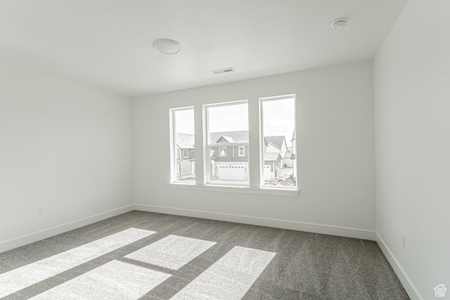 3772 W 1200 N Unit 135, Lehi, UT 84043 - spare room featuring carpet floors, baseboards, and a smoke detector
