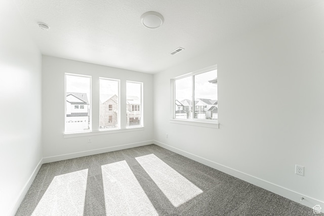 3772 W 1200 N Unit 135, Lehi, UT 84043 - spare room with carpet flooring, baseboards, and a smoke detector