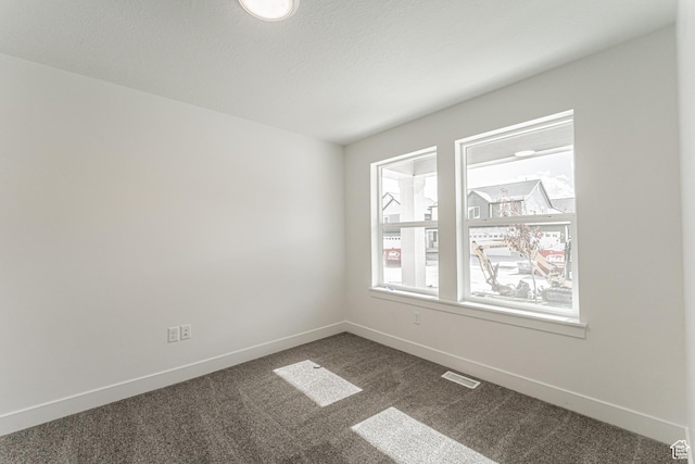 3772 W 1200 N Unit 135, Lehi, UT 84043 - unfurnished room with dark carpet and baseboards