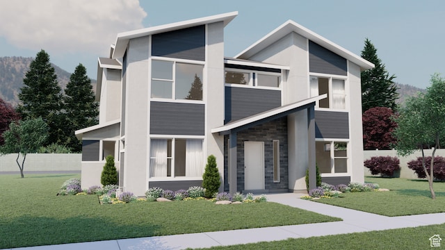 contemporary home featuring a front lawn