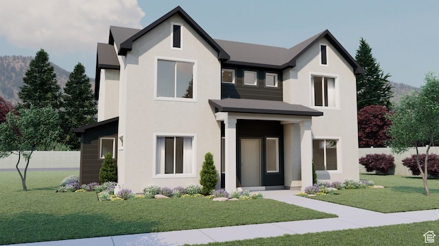 view of front of home with a front yard