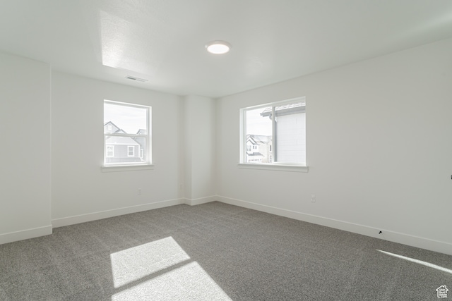 view of carpeted spare room