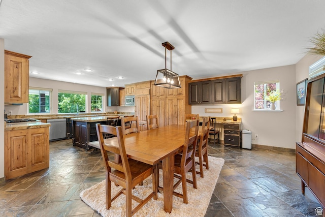 9065 Meadow Dr, Sundance, UT 84604 - dining area with stone tile flooring, recessed lighting, and baseboards