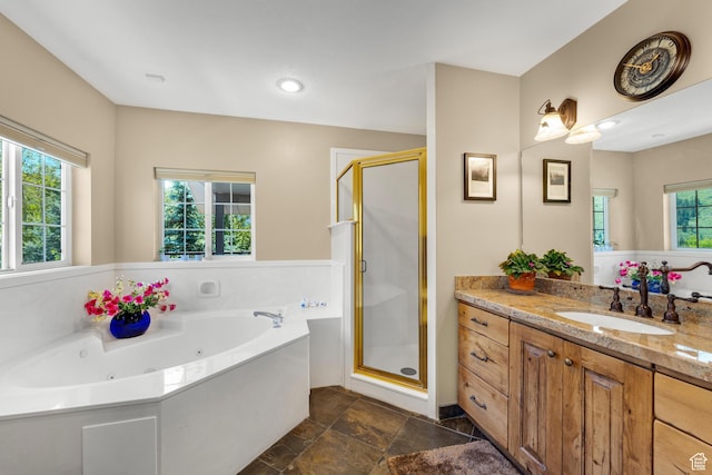 9065 Meadow Dr, Sundance, UT 84604 - full bath featuring stone finish flooring, a whirlpool tub, a shower stall, and vanity