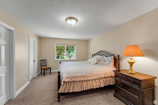 9065 Meadow Dr, Sundance, UT 84604 - bedroom featuring a textured ceiling, baseboards, and light carpet