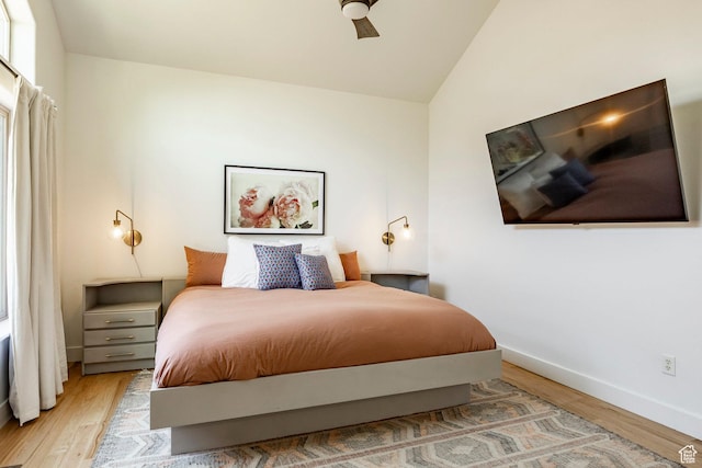 8389 N Pointe Dr, Park City, UT 84098 - bedroom with baseboards, ceiling fan, wood finished floors, and vaulted ceiling