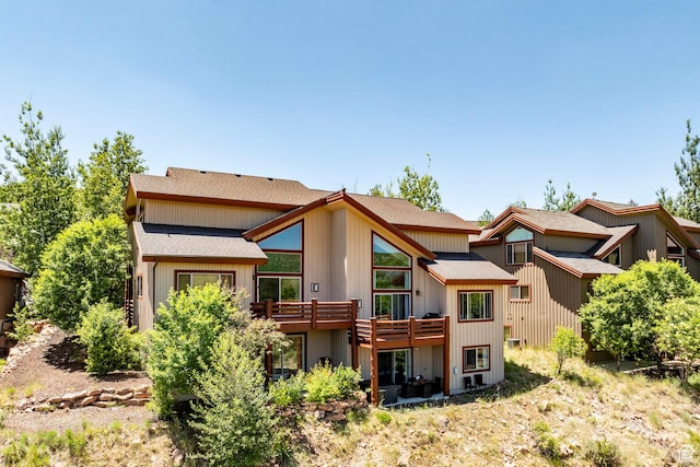 8389 N Pointe Dr, Park City, UT 84098 - rear view of house with a shingled roof and a deck