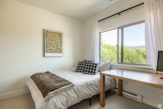 8389 N Pointe Dr, Park City, UT 84098 - carpeted bedroom featuring baseboards and a baseboard radiator