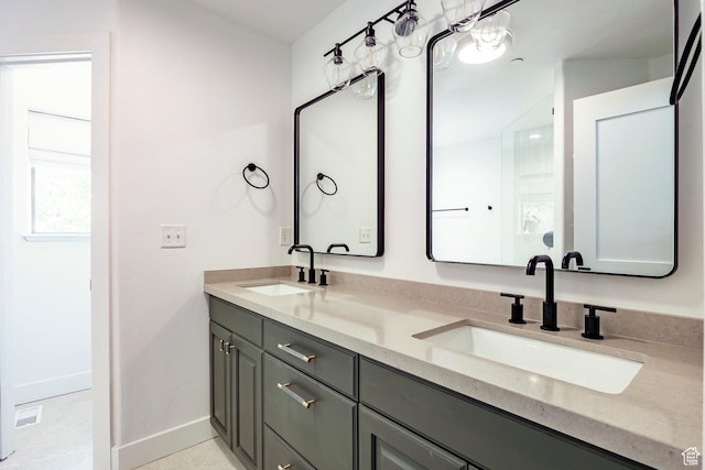8389 N Pointe Dr, Park City, UT 84098 - full bath featuring double vanity, a sink, and baseboards