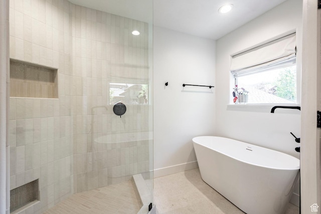 8389 N Pointe Dr, Park City, UT 84098 - bathroom featuring baseboards, recessed lighting, walk in shower, and a freestanding bath