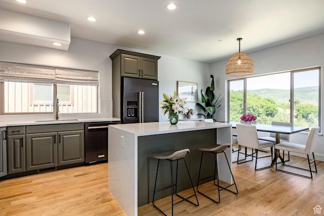 8389 N Pointe Dr, Park City, UT 84098 - kitchen featuring a sink, light wood-type flooring, high quality fridge, and dishwasher