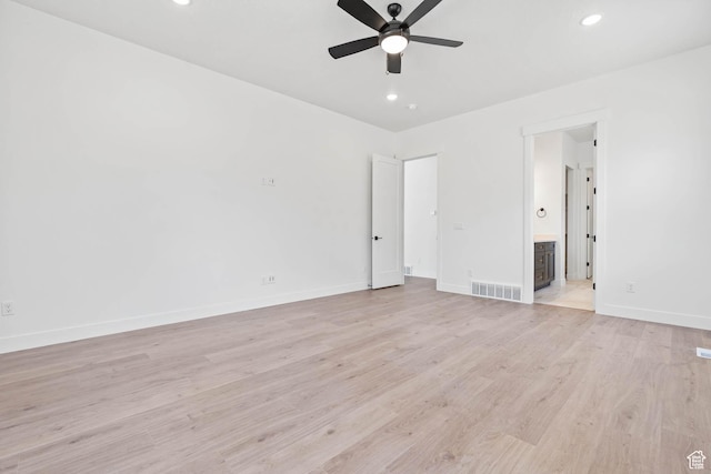 interior space with visible vents, baseboards, light wood finished floors, and recessed lighting