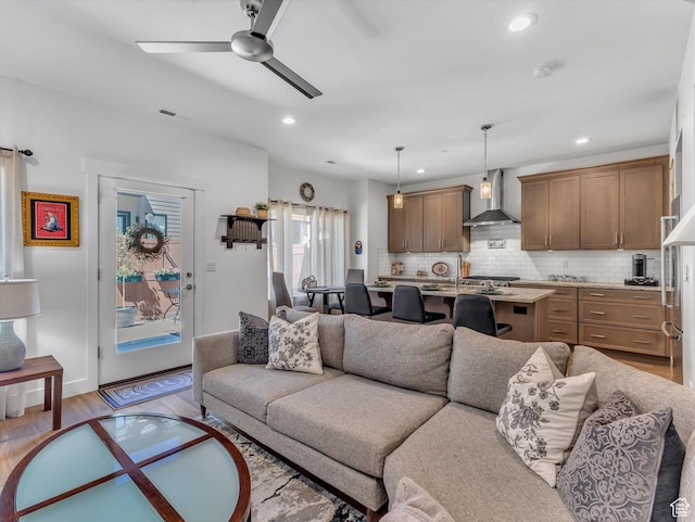8257 N Sandalwood Ln, Park City, UT 84098 - living room featuring ceiling fan and light hardwood / wood-style flooring