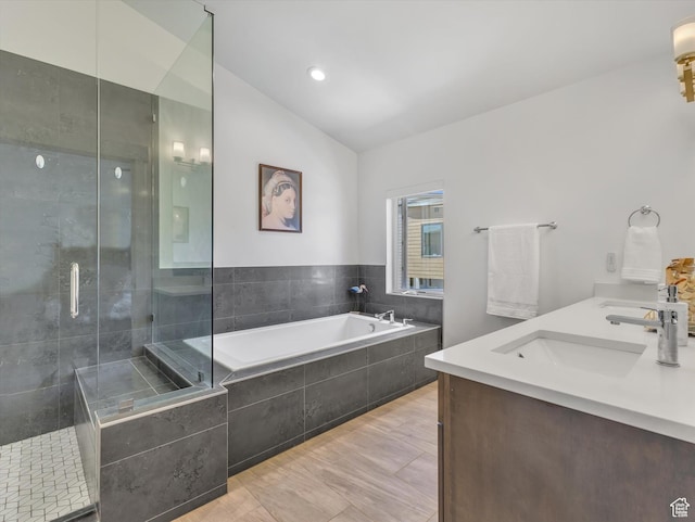 8257 N Sandalwood Ln, Park City, UT 84098 - bathroom with shower with separate bathtub, vanity, and lofted ceiling