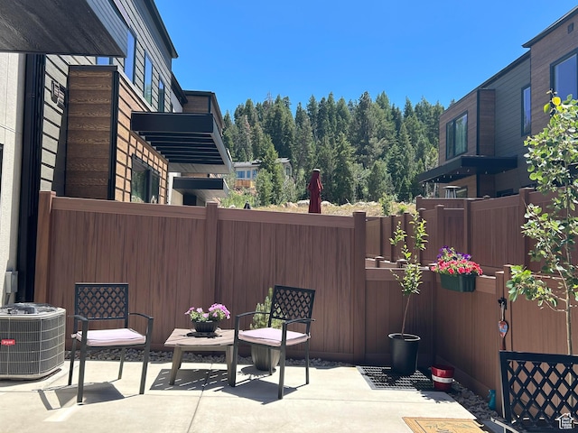 8257 N Sandalwood Ln, Park City, UT 84098 - view of patio featuring cooling unit