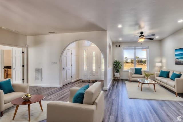 4119 Valle Del Sol Dr, Moab, UT 84532 - living area with ceiling fan, arched walkways, visible vents, recessed lighting, and wood finished floors