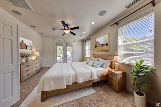 4119 Valle Del Sol Dr, Moab, UT 84532 - bedroom with access to outside, light colored carpet, a ceiling fan, and visible vents