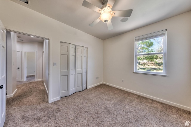 4119 Valle Del Sol Dr, Moab, UT 84532 - unfurnished bedroom with a closet, carpet flooring, baseboards, and a ceiling fan