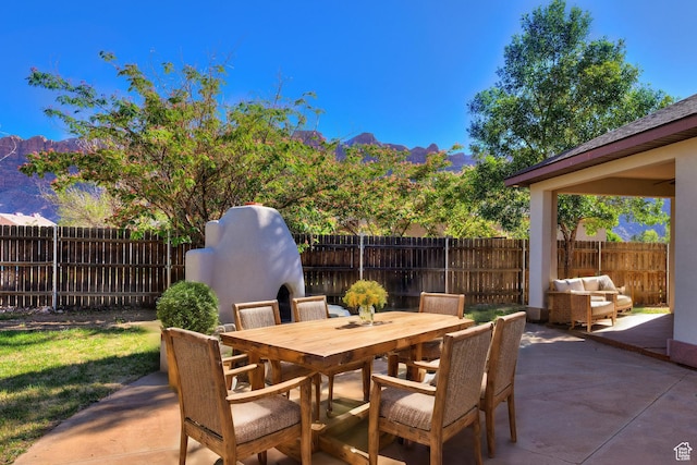 4119 Valle Del Sol Dr, Moab, UT 84532 - view of patio / terrace featuring outdoor dining space and a fenced backyard