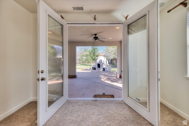 4119 Valle Del Sol Dr, Moab, UT 84532 - doorway with ceiling fan, carpet, visible vents, french doors, and baseboards