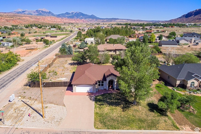 4119 Valle Del Sol Dr, Moab, UT 84532 - drone / aerial view with a mountain view and a residential view