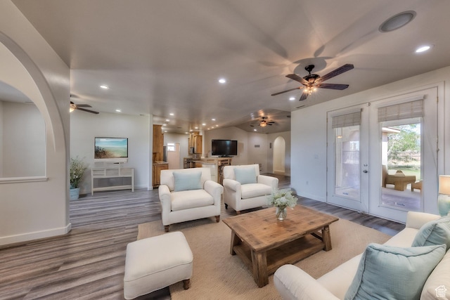 4119 Valle Del Sol Dr, Moab, UT 84532 - living area with recessed lighting, arched walkways, wood finished floors, and ceiling fan